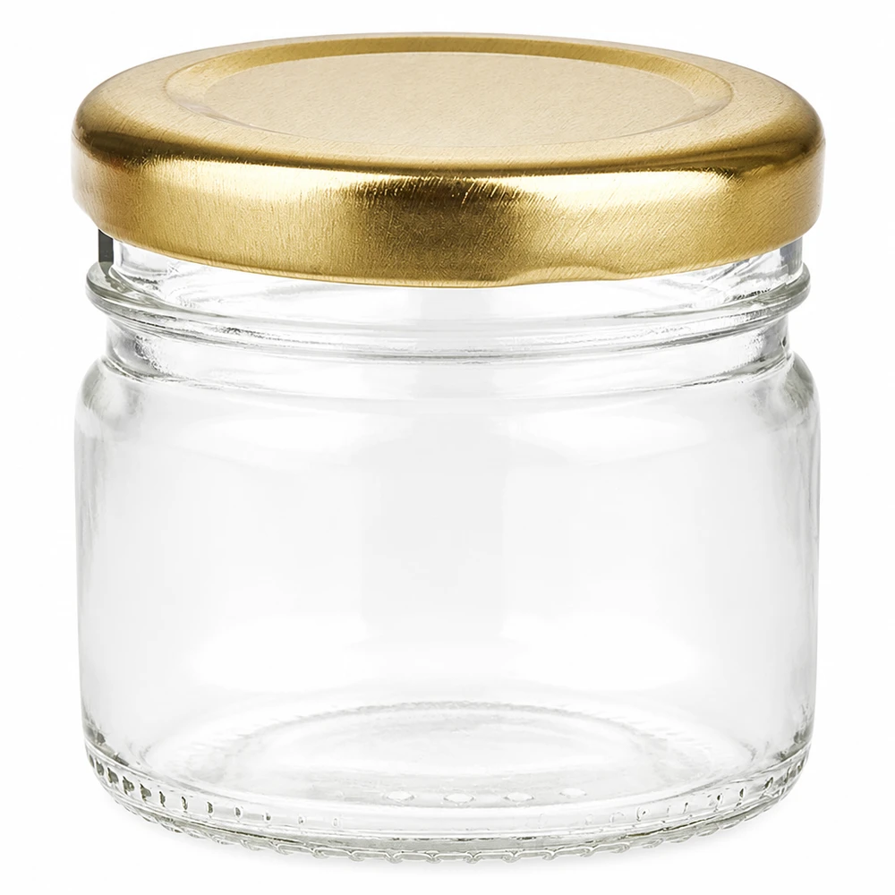33 ml rund glasburk + BasicSeal-lock, guld, UNiTWIST Litet runt glas 33 ml med guldfärgat BasicSeal-skruvlock i klart glas för sylt och honung