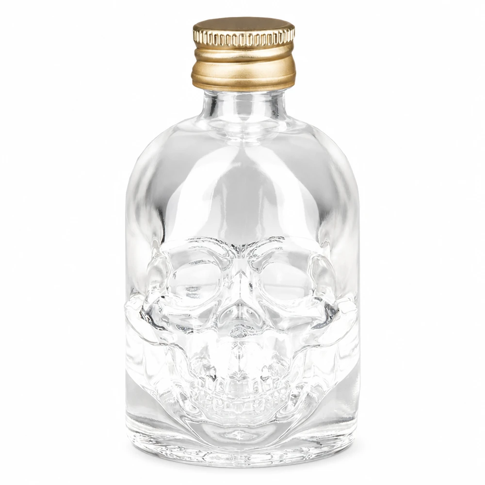 50 ml glasflaska Hector och skruvkork guld UNiTWIST® 50 ml Hector glasflaska med dödskallemotiv och UNiTWIST skruvkork i guld för sprit och drinkar