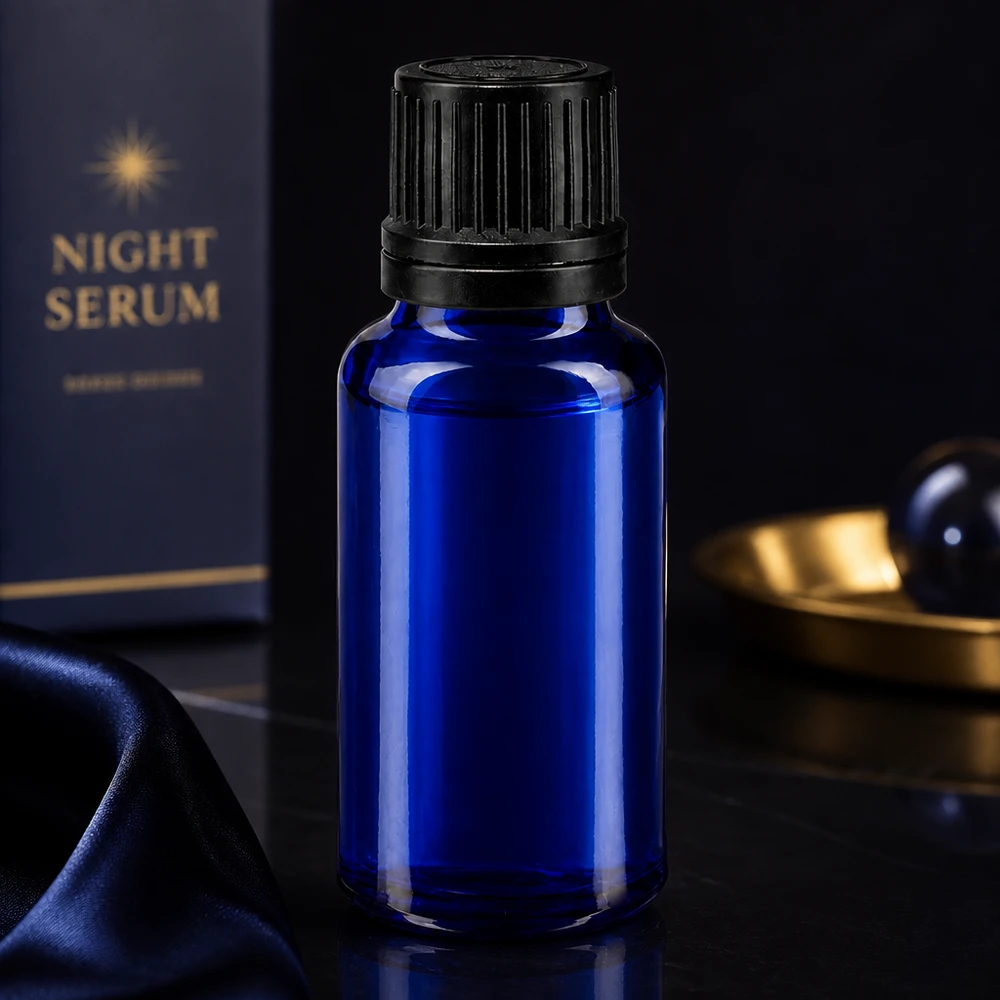 Koboltblå droppflaska på 20 ml med svart OV-lock för serum och eteriska oljor