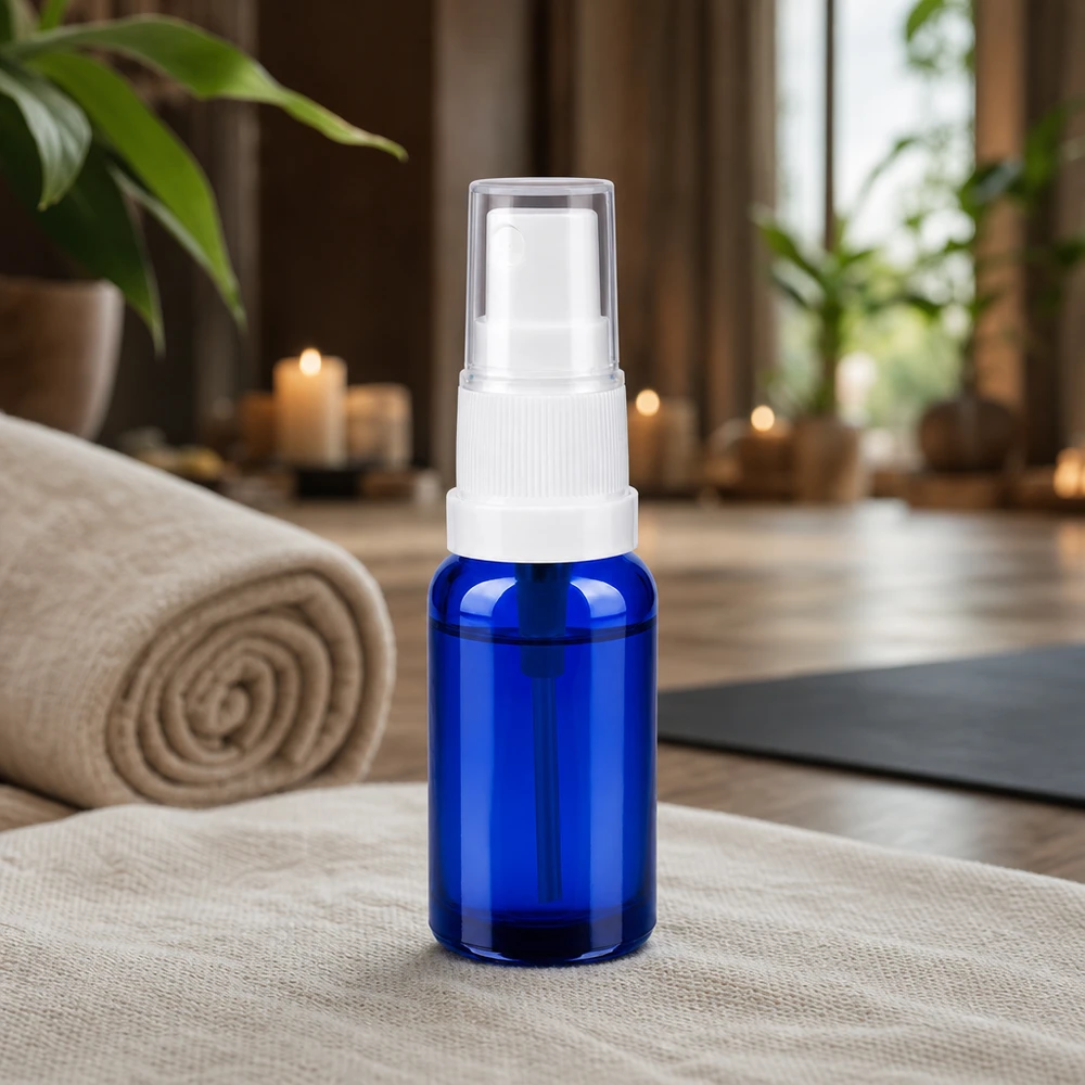 Praktisk 20 ml sprayflaska i glas från BlueLine-serien med ergonomisk vit spraytillsats UT18/20