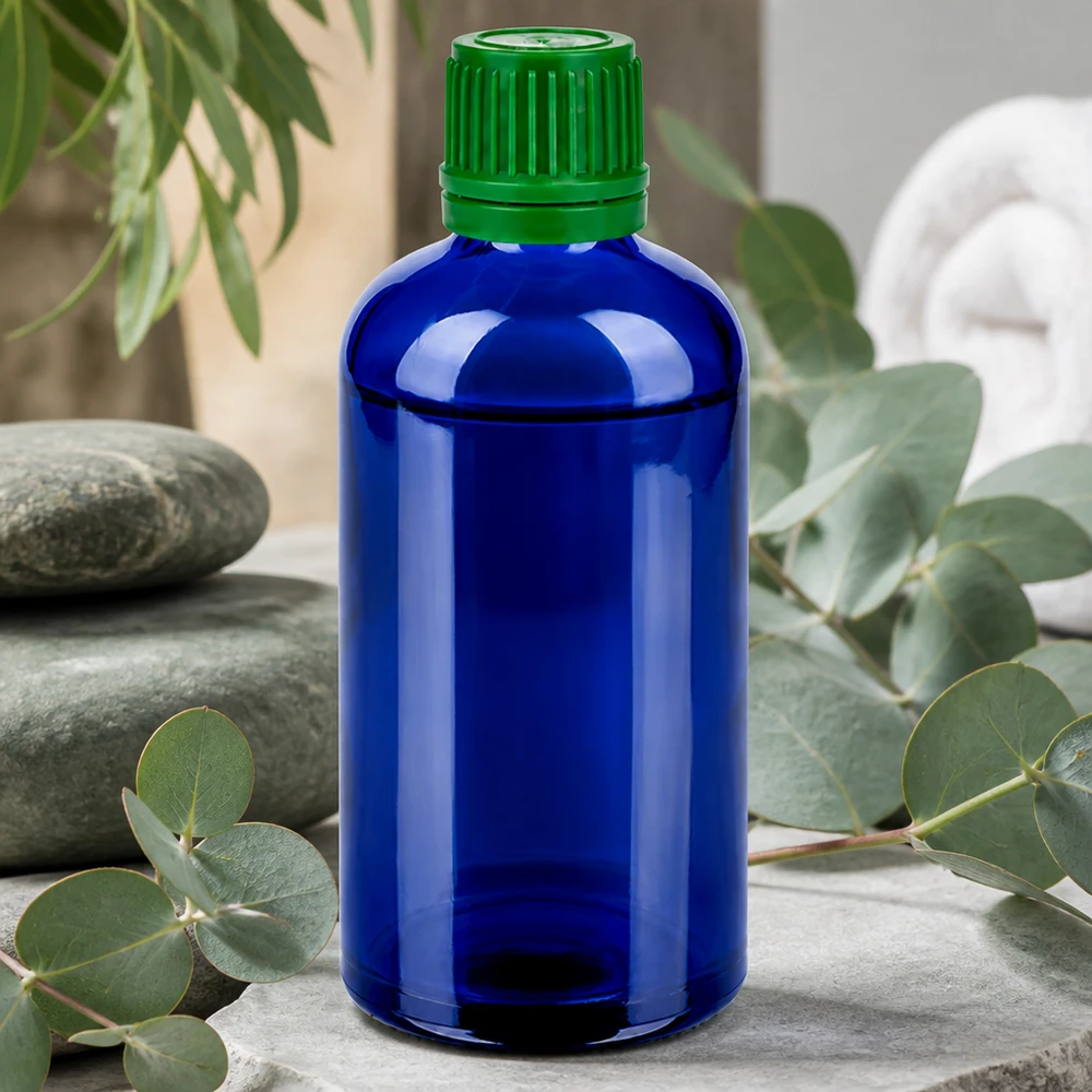 100ml flaska 11mm skruvkork grönt manipuleringssäkert lock BlueLine UT18/100 Högkvalitativ glasflaska 100ml i elegant blått med praktiskt grönt 11mm skruvlock