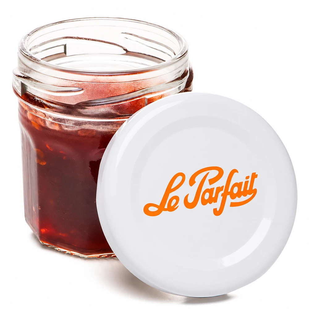 Le Parfait® Mini‑Jam 44 ml Ø48 mm burk Le Parfait miniburk 44ml öppnad fylld med röd sylt och orange logotyp på vitt lock