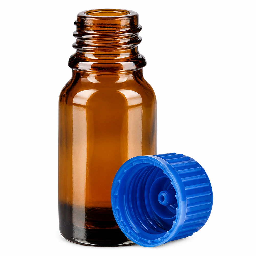 Liten 10 ml bärnstensfärgad glasflaska med räfflat blått lock för eteriska oljor och tinkturer