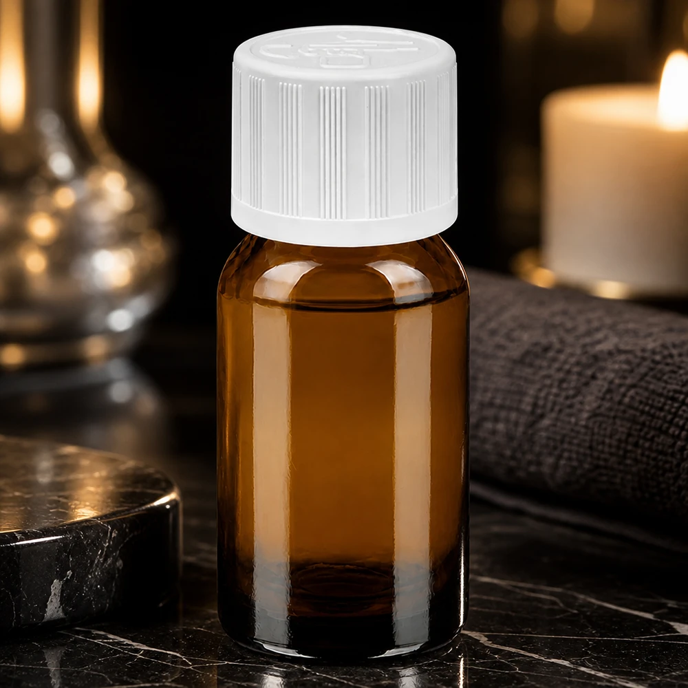 Kompakt 10 ml flaska av UV-skyddande bärnstensfärgat glas med vitt lock för homeopati