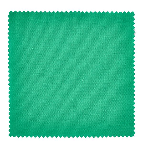 Smyckesunderlägg i tyg grön 12cm kvadrat Grönt tyg med taggig kant närbild för smyckesunderlägg 12cm kvadrat syltburkslock