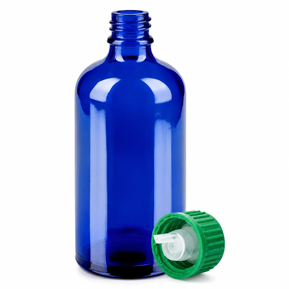 100 ml blå glasflaska med grönt skruvlock och pipett för aromaterapi och kosmetika