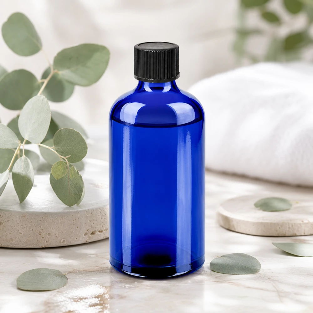 100ml Droppflaska 1mm svart standardförslutning BlueLine UT18/100 Högkvalitativ blå glasflaska 100 ml med exakt 1 mm droppinsats för optimal dosering av aktiva ingredienser