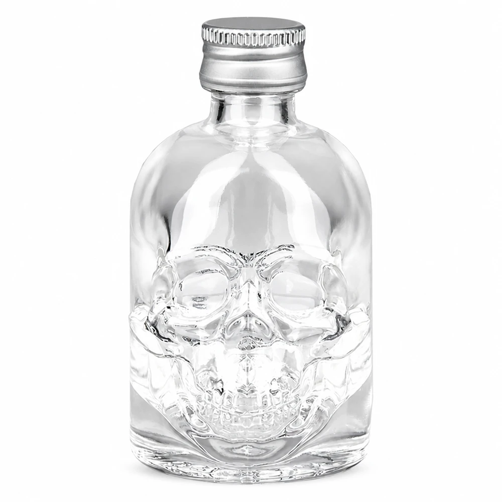 50 ml Hector glasflaska med relief av dödskalle och UNiTWIS skruvkork i silver mot en vit bakgrund