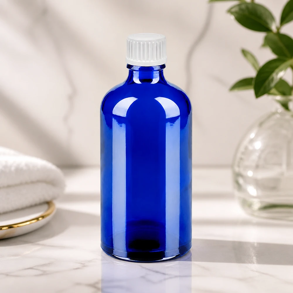 Elegant blå glasflaska 100ml med vit droppkork för snygg förvaring BlueLine UT18