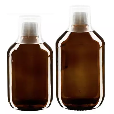 Flacons médicaux bruns avec gobelet doseur
