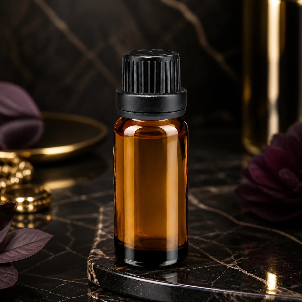 Apoteksflaska brun 10ml dropplock hällring 2mm svart manipuleringssäkert lock Brun glasflaska på 10 ml med svart barnsäkerhetslock på svart marmor