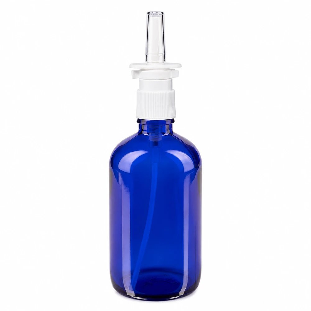 Apoteksflaska blå 100ml nässpray vit standard 100 ml blå nässprayflaska av apotekerglas med vit sprutmunstycke och genomskinlig munstycke