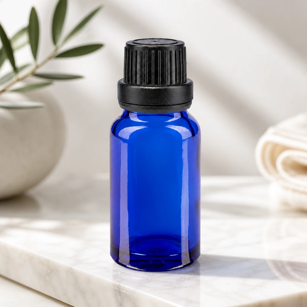 Apoteksflaska blå 10ml dropplock hällring 2mm svart manipuleringssäkert lock 10 ml droppflaska i apotekerglas, blå, med barnsäker OV-förslutning och precis 2 mm droppinsats