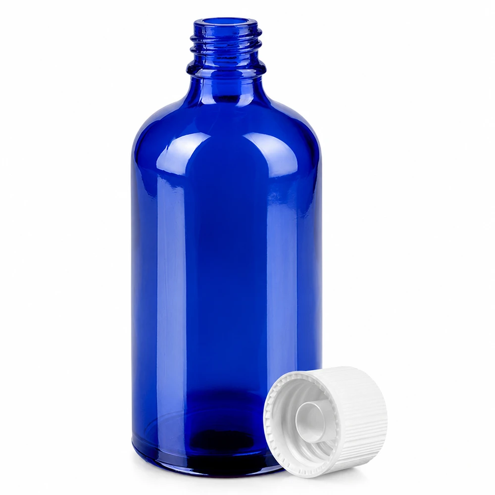 100 ml koboltblå apoteksflaska med 11 mm gänga och vitt lock för exakt dosering