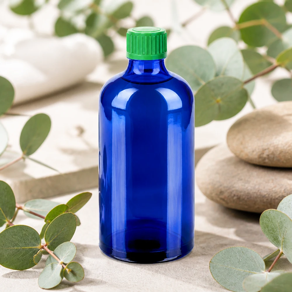 Blå glasflaska 100 ml med standard dropplock för eteriska oljor och tinkturer