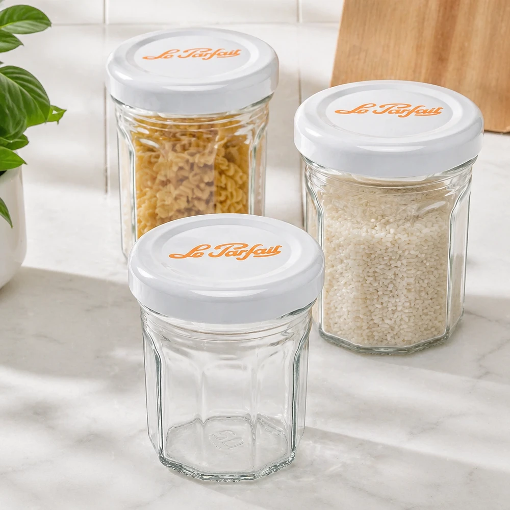 Le Parfait® Mini‑Jam 44 ml Ø48 mm burk Le Parfait minitumblers 44 ml set med vita lock - en tom, två fyllda med ris och pasta