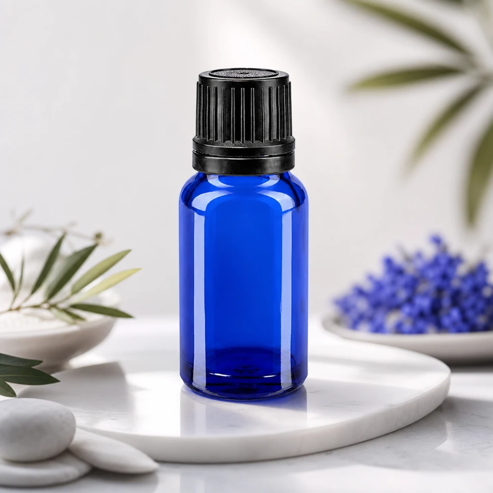 Blauglas droppflaska 10 ml med svart OV-säkerhetslock och precis doseringsinsats på 1 mm
