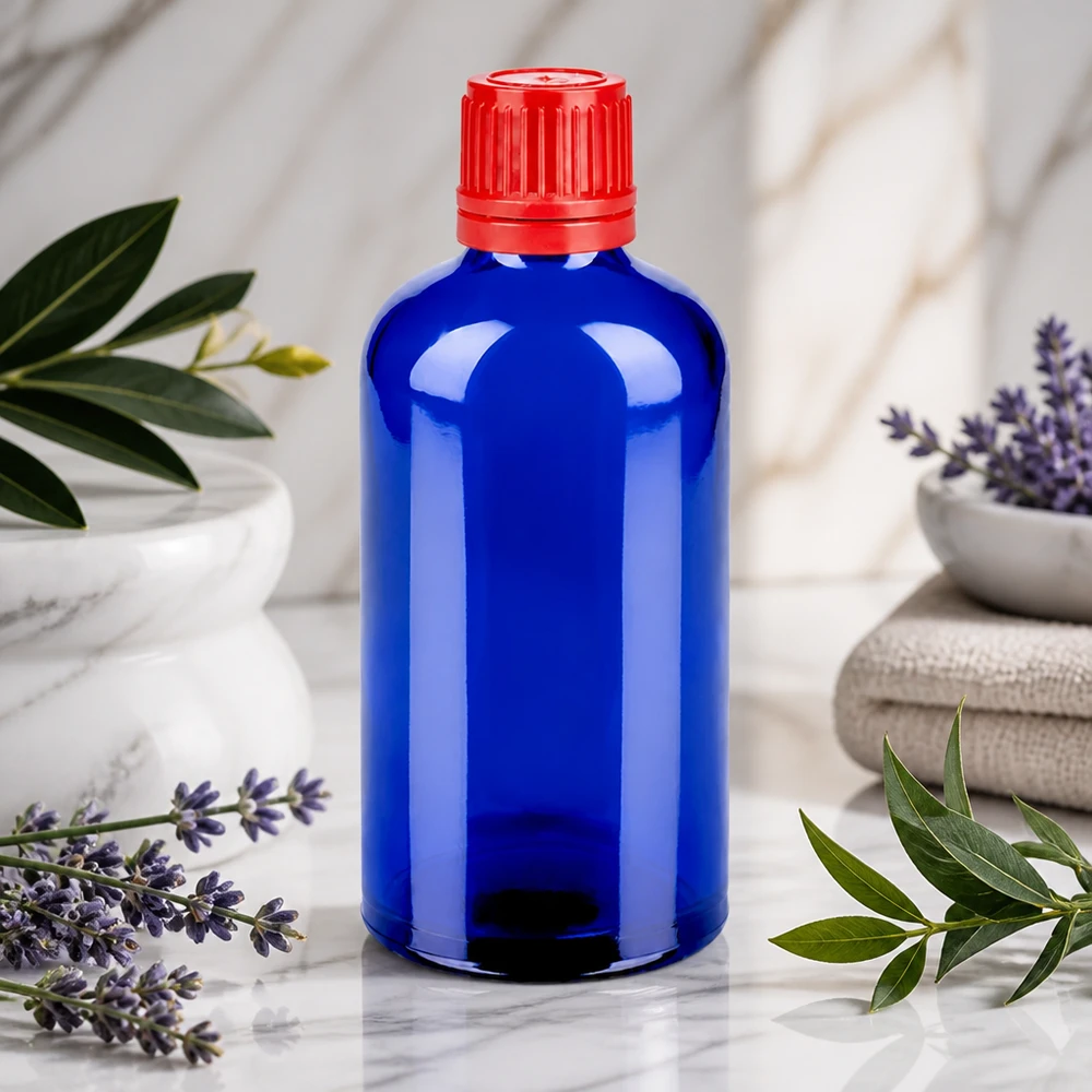 Blå glasflaska 100 ml BlueLine UT18 med manipulationsskyddad förslutning för säker produktförvaring