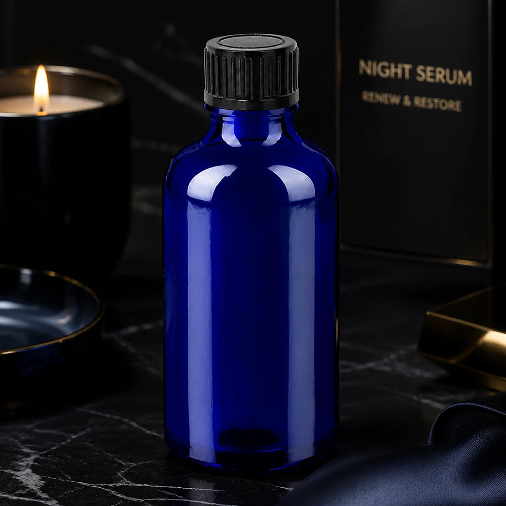 50ml flaska 11mm skruvkork svart standard BlueLine UT18/50 Kompakt 50 ml glasflaska i BlueLine-serien för serum och kosmetiska produkter i koboltblått