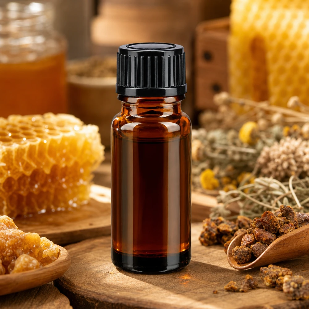 Brun 10 ml apoteksflaska med svart skruvlock, med motiv av honungskakor och propolis