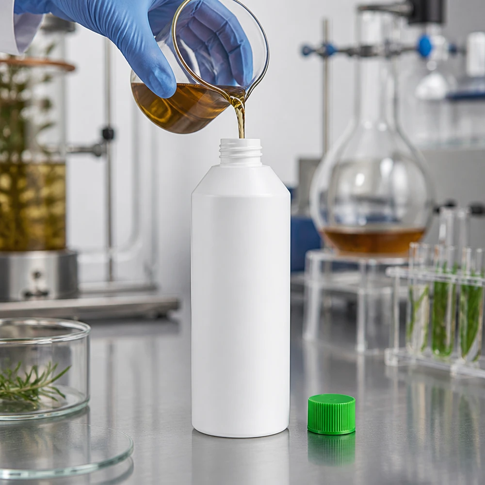 HDPE-apotekflaska, 250 ml, vit med grönt lock, fylls med växtextrakt