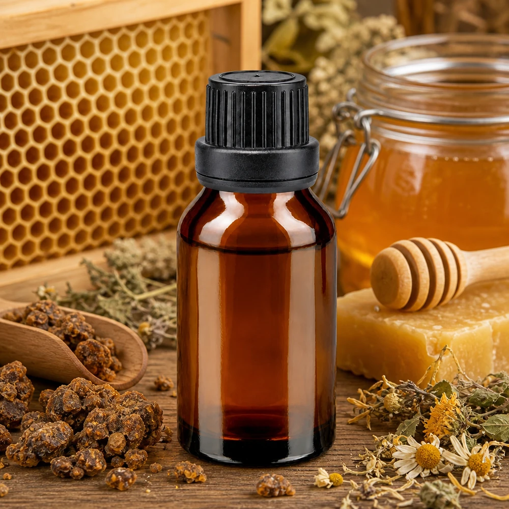 Brun glasflaska på 15 ml med droppflaska, avsedd för honung, bivax och propolis samt andra naturprodukter