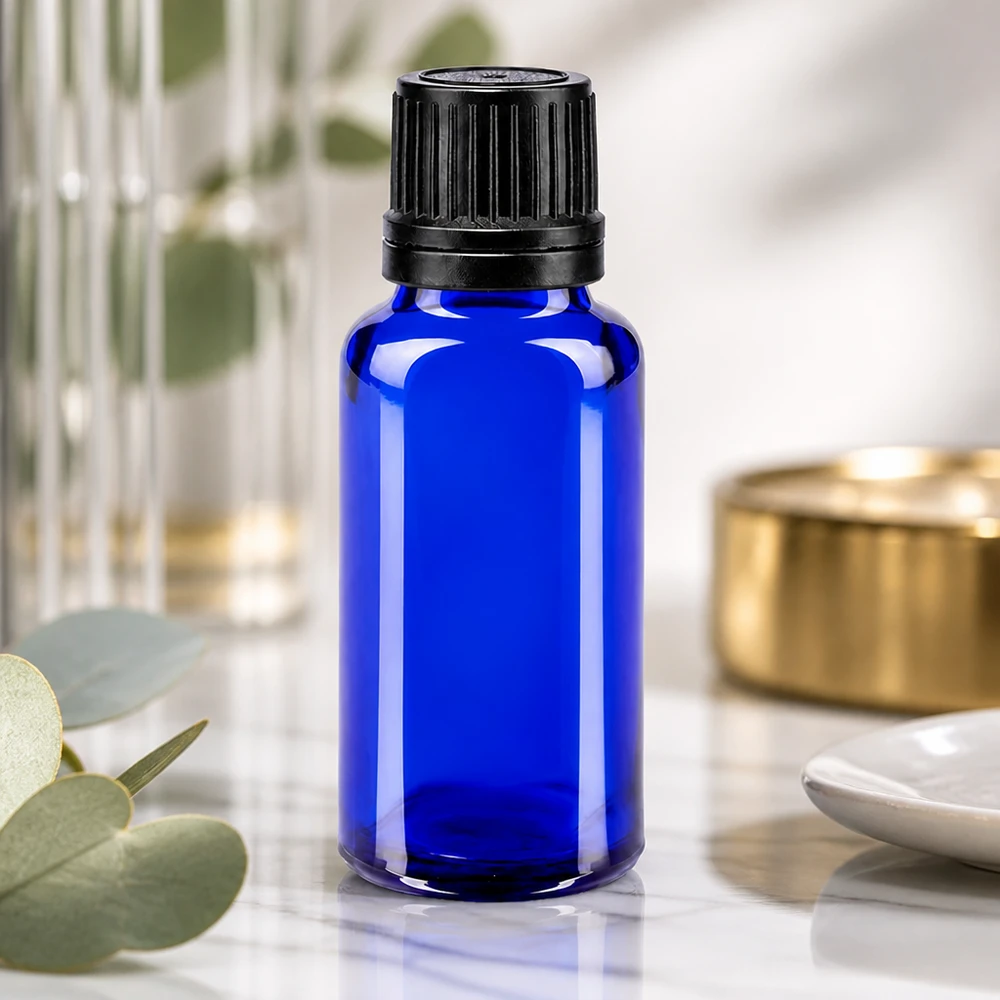 Apoteksflaska blå 20ml droppflaska vit 0,8mm standard Koboltblå 20 ml apotekarflaska av UV-skyddande glas med svart originalförslutning