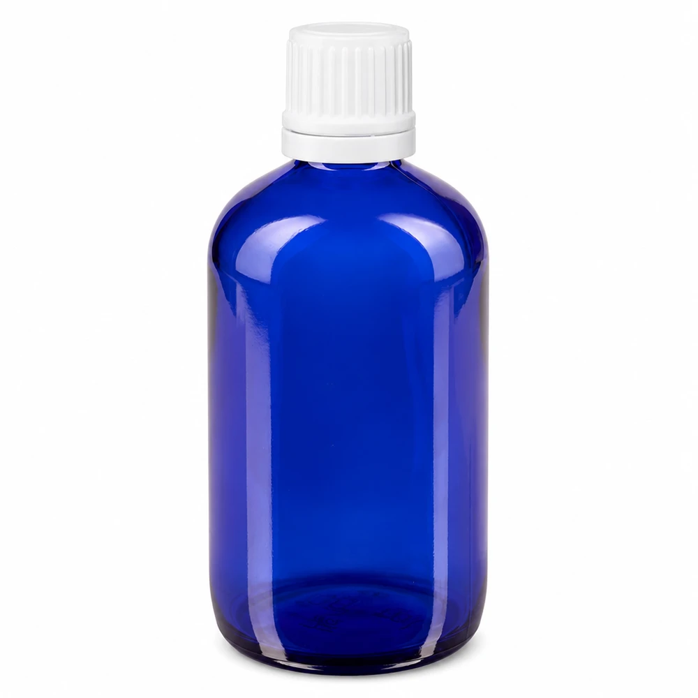 100 ml blå apoteksflaska i glas med vitt originalförslutningslock och 0,7 mm droppinsats