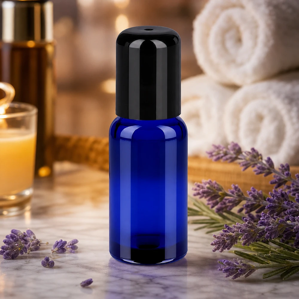 20 ml glasflaska med roll-on-applikator i intensivt blått för aromaterapi- och parfymoljor