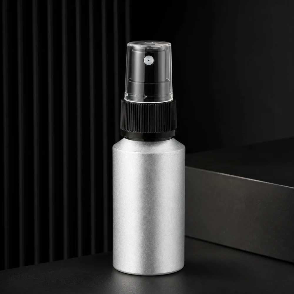30 ml flaska i inlagd aluminium med finfördelare Kompakt 30 ml aluminiumflaska med transparent sprayhuvud för mobila applikationer i farten