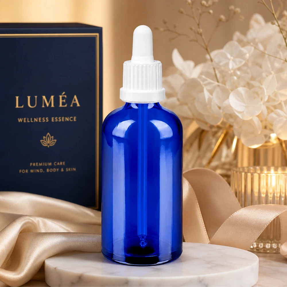 100 ml pipettflaska vit med säkerhetsförslutning BlueLine UT18/100 Elegant blå 100 ml glasflaska med vit pipett för serum och wellness-essenser BlueLine UT18/100
