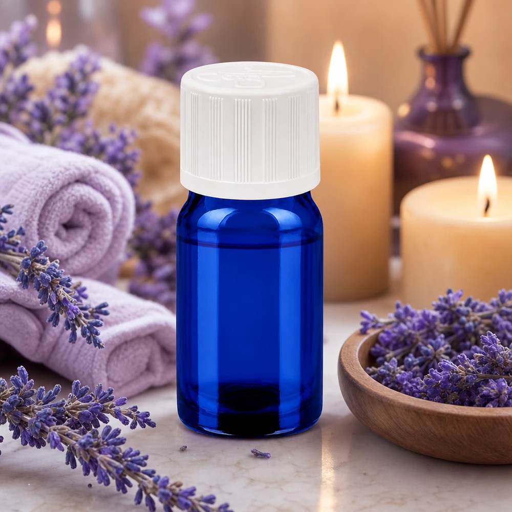 Liten blå glasflaska 5 ml med barnsäkert lock, idealisk för eteriska oljor och aromaterapi