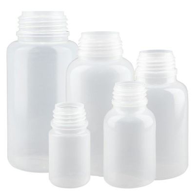 Flaskor med vid hals och sandfärgad kork