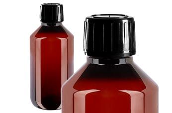 Bruna medicinska PET-flaskor med svart sprutlock