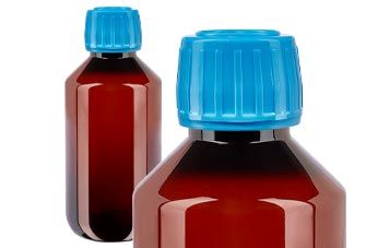 Bruna medicinska flaskor i PET med blå lock